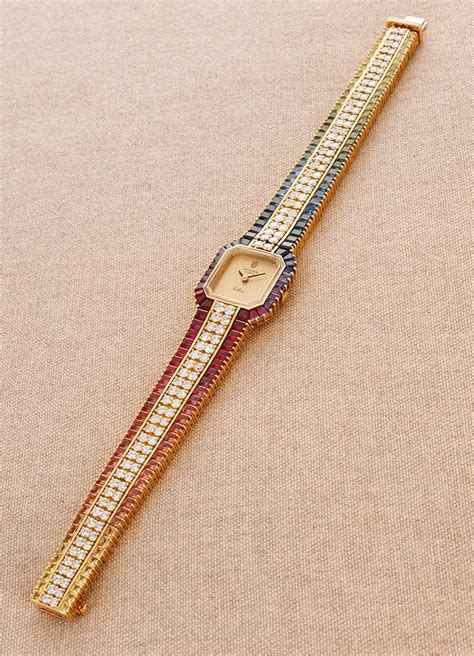 rolex rainbow cellini